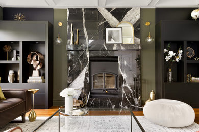 Living room - large transitional medium tone wood floor, brown floor and coffered ceiling living room idea in Montreal with green walls, a standard fireplace, a stone fireplace and a wall-mounted tv