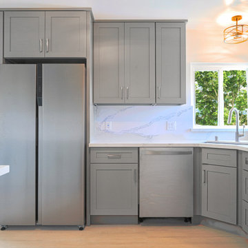 Modern Gray Shaker Kitchen Remodel with White Quartz Countertops