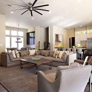 Large transitional open concept dark wood floor family room photo in Dallas with beige walls, no fireplace and no tv