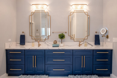 Inspiration for a large transitional master porcelain tile, gray floor and double-sink bathroom remodel in San Diego with shaker cabinets, blue cabinets, gray walls, an undermount sink, quartz countertops, white countertops and a built-in vanity