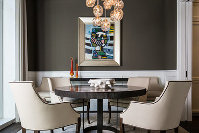 Inspiration for a mid-sized modern carpeted and gray floor enclosed dining room remodel in New York with gray walls