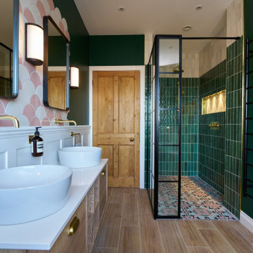 Soft Pinks and Bold Green Bathroom with Black Fixtures