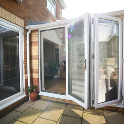 White Conservatory with PVCu Bi-Fold Doors - Products