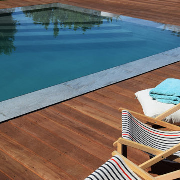 Transformation, rénovation et agrandissement d’une piscine contemporaine