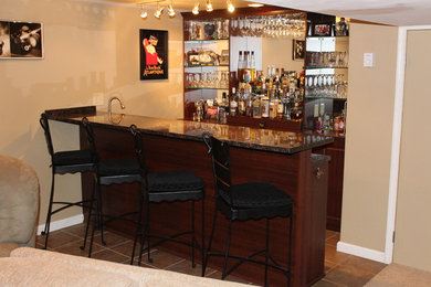 Large home bar in Philadelphia with terracotta flooring.