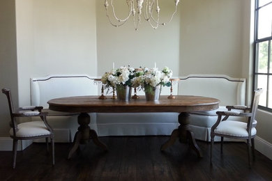 Inspiration for a mid-sized rustic dark wood floor kitchen/dining room combo remodel in Phoenix with beige walls and no fireplace