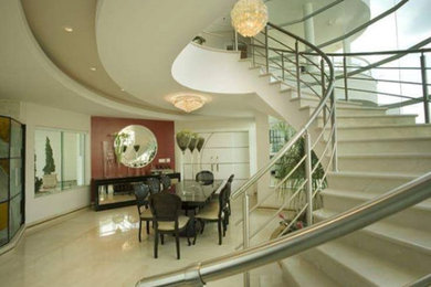 Great room - large modern beige floor great room idea in New York with white walls and no fireplace