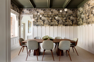 Photo of a transitional dining room in Melbourne with multi-coloured walls, carpet, beige floor, coffered, wood, decorative wall panelling and wallpaper.