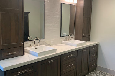 Inspiration for a master white tile and subway tile ceramic tile, gray floor and double-sink bathroom remodel in Other with dark wood cabinets, gray walls, white countertops and a built-in vanity