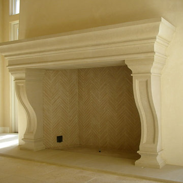 Italian style hand-carved stone fireplace.