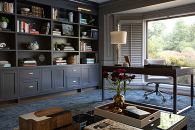 Inspiration for a large transitional freestanding desk carpeted and blue floor study room remodel in San Francisco with gray walls