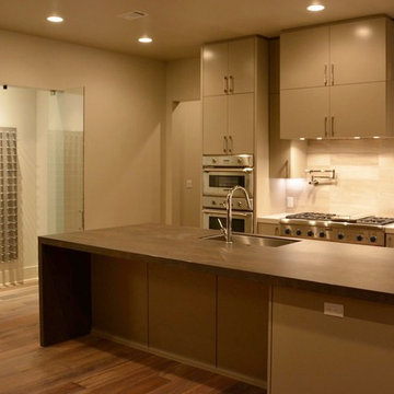Glass wine cellar in the modern kitchen - Austin TX