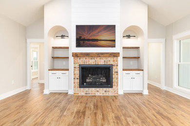 Example of a country living room design in Other