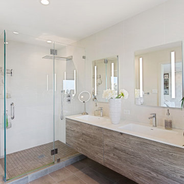 The bathroom in the primary suite with floating vanity