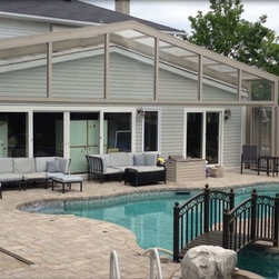 Pool Enclosure retracts over House - Products