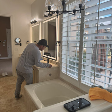 Curd-less walk-in shower; heated floors in bathroom + shower+bench LED