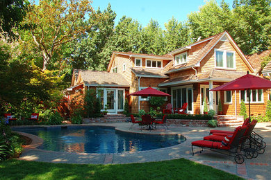 Inspiration for a transitional two-story wood exterior home remodel in Sacramento