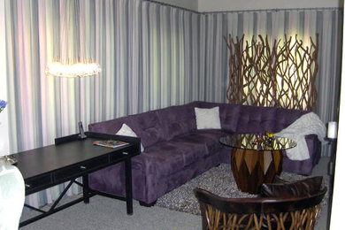 Inspiration for a mid-sized contemporary open concept carpeted living room library remodel in Other with white walls and a wall-mounted tv