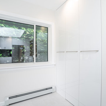 Custom Floor-to-Ceiling Storage with Hidden Laundry – Kerrisdale Vancouver Renov