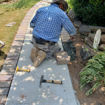 Driveway and sidewalk replacement with custom brick inlay