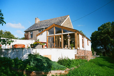 Design ideas for a classic bungalow render detached house in Cornwall with a pitched roof.