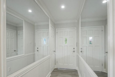 Inspiration for a transitional entryway remodel in New Orleans