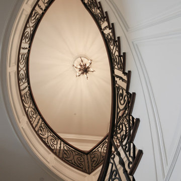 Project #74 | Circular Staircase with Hand-Forged Metal Panels