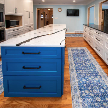 Kitchen with White Perimeter and Blue Island Cabinet Reface