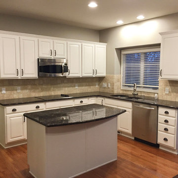 Cabinets Refinished from Cherry to White
