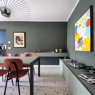 Oasi colorata: soggiorno e cucina tra Blu, Verde e Arancio