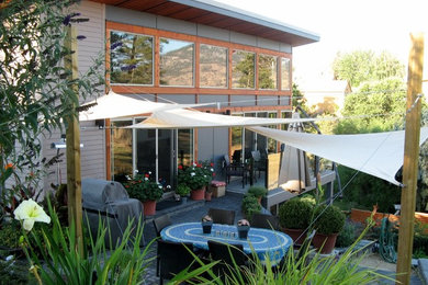Patio - contemporary patio idea in Vancouver