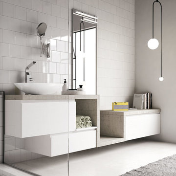 Modern white bathromo with inductrial accents