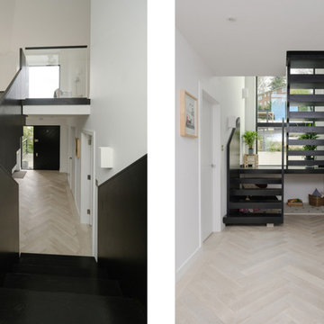 Bespoke black timber staircase for bungalow conversion