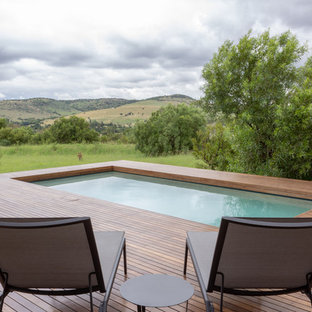 Oberirdisches, Mittelgroßes Modernes Pool im Vorgarten in rechteckiger Form mit Dielen in Sonstige