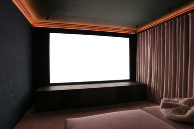 Design ideas for a contemporary home cinema in West Midlands.