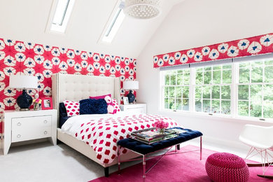 Photo of a transitional kids' room for girls in New York with multi-coloured walls and carpet.