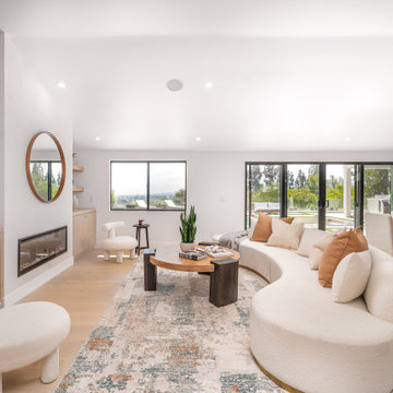 Living Room with Linear Fireplace and Oak Media Wall
