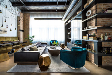 Family room - contemporary open concept family room idea in Chicago with no fireplace