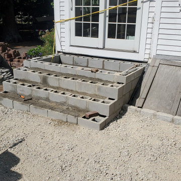 Granite and brick patio, entrance steps and walkway
