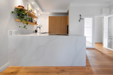 Design ideas for a modern kitchen in London with quartz worktops.