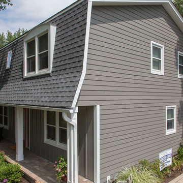 Naperville home with renovated exterior and gambrel roof.