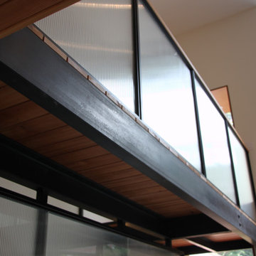 Glass and black metal railings