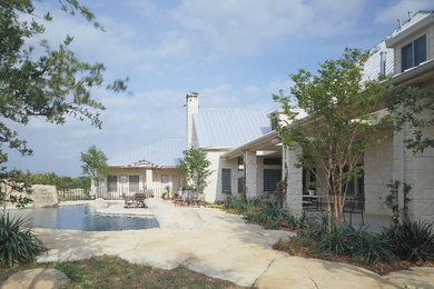 Inspiration for a huge timeless exterior home remodel in Dallas