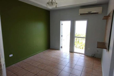 Mid-sized minimalist home design photo in Other
