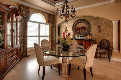 Inspiration for a large timeless porcelain tile dining room remodel in Tampa