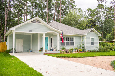Inspiration for a small craftsman one-story wood house exterior remodel in Atlanta with a shingle roof