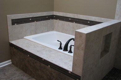 Bathroom - mid-sized traditional master bathroom idea in Chicago with dark wood cabinets and beige walls