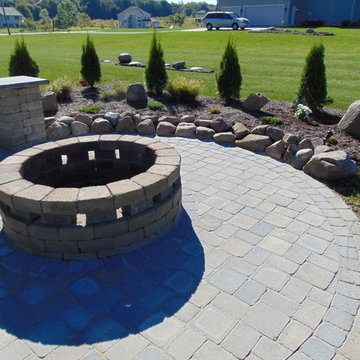 Simple addition to Patio with rock accents and mulch bed