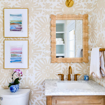 Powder Room with Marble Vanity & Brushed Gold Fixtures