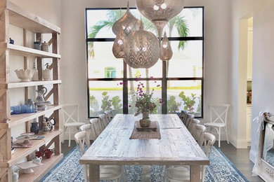 Example of a tuscan dining room design in Miami